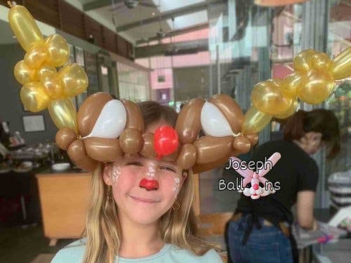 Reindeer Hat Balloon Sculpture and Face Painting